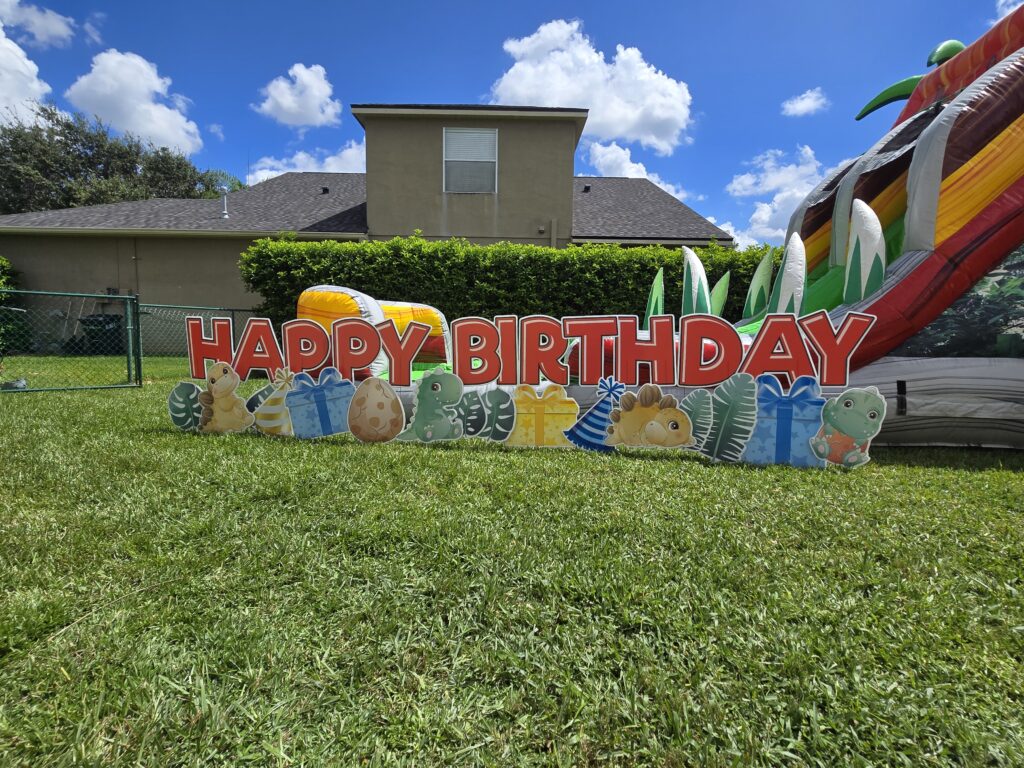 dinosaur birthday sign yard display