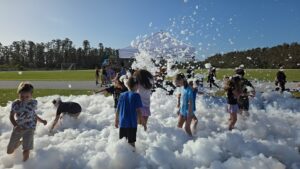 kids playing in foam party rental Trinity Florida backyard