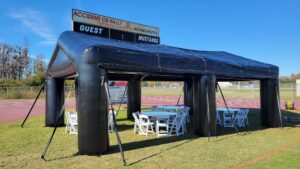 Tables chairs and tent setup for HOA event
